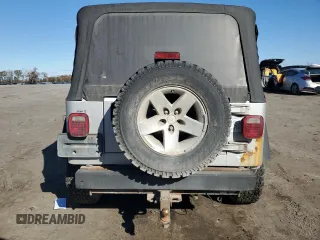2003 Jeep Wrangler Rubicon z VIN 1J4FA69SX3P301962, wystawiony jako Copart lot #79928744 z przebiegiem Nie podano mil oraz Czysty tytuł • Clean title. Historia ofert i sprzedaży dostępna na DreamBid. Obrazek 6.