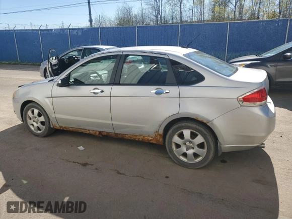2009 Ford Focus SE z VIN 1FAHP35N29W126266, wystawiony jako Copart lot #56886465 z przebiegiem 420 672 mil mil oraz Czysty tytuł • Clean title. Historia ofert i sprzedaży dostępna na DreamBid. Obrazek 2.