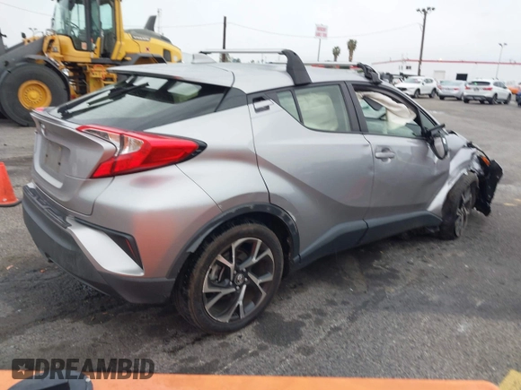 2019 Toyota C-HR XLE with VIN JTNKHMBX8K1046347, listed as a IAAI auction lot 41778368 with 49,918 mi miles and . Bid and sale history available at DreamBid. Image 4.
