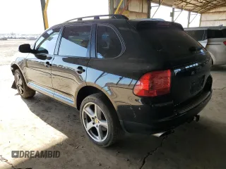 2006 Porsche Cayenne S with VIN WP1AB29P56LA66639, listed as a Copart auction lot 52097595 with 180,827 mi miles and Salvage title. Bid and sale history available at DreamBid. Image 2.
