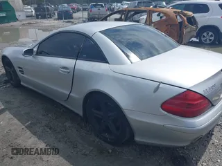 2004 Mercedes-Benz SL 500 z VIN WDBSK75F94F077444, wystawiony jako IAAI lot #42366519 z przebiegiem 181 413 mil mil oraz . Historia ofert i sprzedaży dostępna na DreamBid. Obrazek 3.