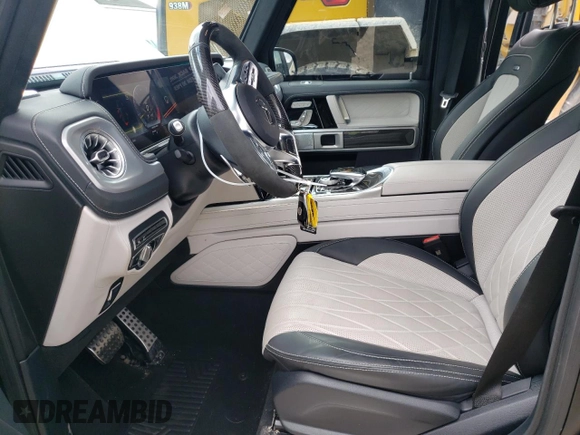 2024 Mercedes-Benz G 63 AMG with VIN W1NYC7HJ0RX504884, listed as a Copart auction lot 50609385 with 3,591 mi miles and Salvage Title. Bid and sale history available at DreamBid. Image 7.