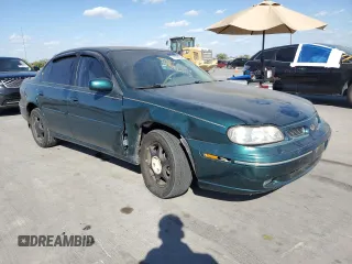 1999 Oldsmobile Cutlass GL z VIN 1G3NB52M3X6330302, wystawiony jako Copart lot #77639734 z przebiegiem 106 995 mil mil oraz Czysty tytuł • Clean title. Historia ofert i sprzedaży dostępna na DreamBid. Obrazek 4.
