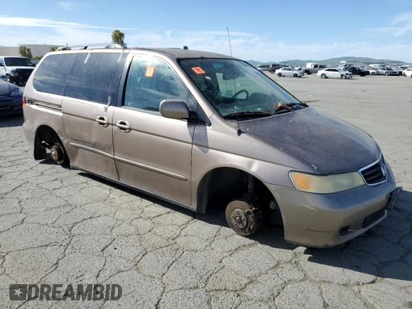 2003 Honda Odyssey EX-L z VIN 5FNRL18043B154662, wystawiony jako Copart lot #52896015 z przebiegiem 216 099 mil mil oraz Szkoda całkowita • Salvage title. Historia ofert i sprzedaży dostępna na DreamBid. Obrazek 4.