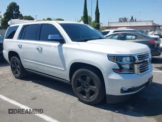 2016 Chevrolet Tahoe LTZ with VIN 1GNSKCKC0GR420284, listed as a IAAI auction lot 42647889 with 106,016 mi miles and . Bid and sale history available at DreamBid. Image 1.