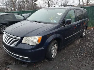 2012 Chrysler Town & Country Touring with VIN 2C4RC1BG4CR216670, listed as a IAAI auction lot 41950320 with 156,359 mi miles. Bid and sale history available at carsss.com. Image 2.
