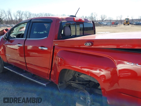 2015 GMC Canyon 4WD SLT z VIN 1GTG6CE38F1266466, wystawiony jako IAAI lot #41822501 z przebiegiem 26 479 mil mil oraz . Historia ofert i sprzedaży dostępna na DreamBid. Obrazek 15.