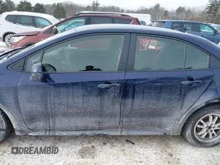 2022 Toyota Corolla Hybrid LE with VIN JTDEAMDEXNJ048722, listed as a IAAI auction lot 41383037 with 72,878 mi miles. Bid and sale history available at carsss.com. Image 14.