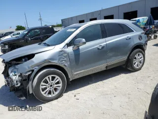2023 Cadillac XT5 FWD Luxury z VIN 1GYKNAR46PZ129317, wystawiony jako Copart lot #53900465 z przebiegiem Nie podano mil oraz Czysty tytuł • Clean title. Historia ofert i sprzedaży dostępna na DreamBid. Obrazek 1.