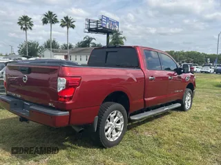 2016 Nissan Titan Platinum Reserve z VIN 1N6BA1F26GN512666, wystawiony jako Copart lot #54364115 z przebiegiem 120 182 mil mil oraz Czysty tytuł • Clean title. Historia ofert i sprzedaży dostępna na DreamBid. Obrazek 4.
