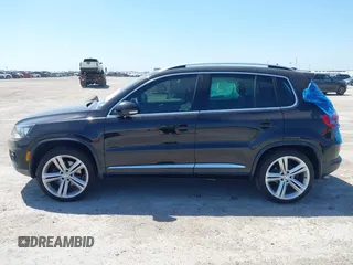 2014 Volkswagen Tiguan SEL with VIN WVGAV3AX4EW025339, listed as a IAAI auction lot 42313665 with 96,756 mi miles and . Bid and sale history available at DreamBid. Image 14.