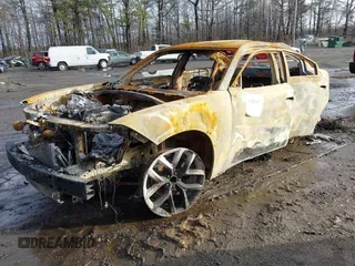 2022 Dodge Charger SXT with VIN 2C3CDXBG1NH166443, listed as a IAAI auction lot 41488607 with Not Provided miles and . Bid and sale history available at DreamBid. Image 2.