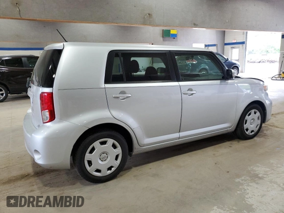 2012 Scion xB with VIN JTLZE4FE4CJ017485, listed as a Copart auction lot 53947535 with 113,979 mi miles and Salvage Title. Bid and sale history available at DreamBid. Image 3.