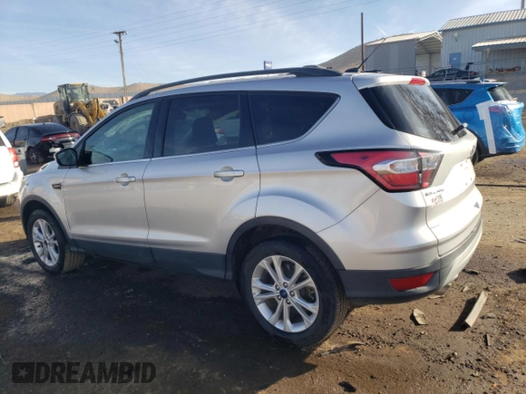 2018 Ford Escape SE with VIN 1FMCU0G96JUC38690, listed as a Copart auction lot 86504514 with 90,811 mi miles and Salvage Title. Bid and sale history available at carsss.com. Image 2.