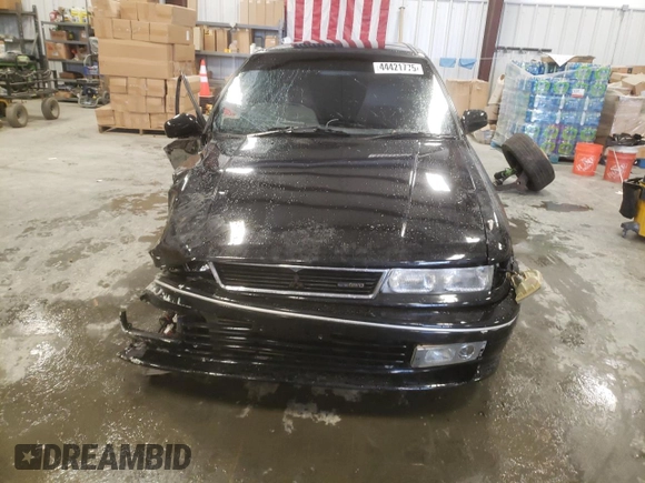 1988 Mitsubishi Galant with VIN E39A0010917, listed as a Copart auction lot 44421775 with 14,813 mi miles and Salvage Title. Bid and sale history available at DreamBid. Image 5.