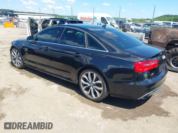 2014 Audi A6 Prestige with VIN WAUHGAFC9EN027338, listed as a IAAI auction lot 42377190 with 164,427 mi miles and . Bid and sale history available at DreamBid. Image 3.