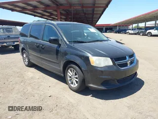 2014 Dodge Grand Caravan SXT with VIN 2C4RDGCG7ER265931, listed as a IAAI auction lot 42141644 with 205,968 mi miles and . Bid and sale history available at DreamBid. Image 1.