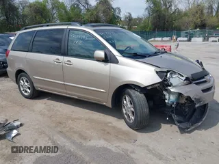 2005 Toyota Sienna XLE with VIN 5TDBA22CX5S049025, listed as a IAAI auction lot 42071795 with 237,858 mi miles. Bid and sale history available at carsss.com. Image 1.