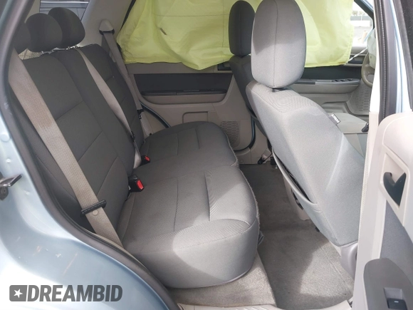 2009 Ford Escape Hybrid with VIN 1FMCU49309KB71172, listed as a IAAI auction lot 40971257 with 118,689 mi miles. Bid and sale history available at carsss.com. Image 8.