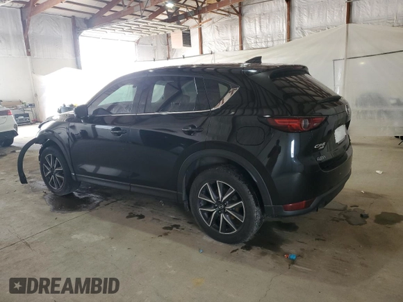 2018 Mazda CX-5 Grand Touring with VIN JM3KFBDM4J0412835, listed as a Copart auction lot 55441315 with 191,968 mi miles and Salvage title. Bid and sale history available at DreamBid. Image 2.