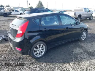 2012 Hyundai Accent SE with VIN KMHCU5AEXCU053645, listed as a IAAI auction lot 41407582 with 118,290 mi miles. Bid and sale history available at carsss.com. Image 4.