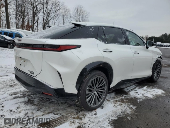 2024 Lexus RZ 450e Premium z VIN JTJAAAABXRA025712, wystawiony jako Copart lot #86183394 z przebiegiem 3 799 mil mil oraz Szkoda całkowita • Salvage title. Historia ofert i sprzedaży dostępna na DreamBid. Obrazek 3.
