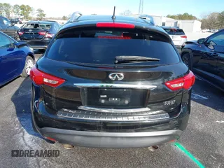 2013 Infiniti FX z VIN JN8CS1MUXDM140215, wystawiony jako IAAI lot #41271039 z przebiegiem 134 887 mil mil oraz . Historia ofert i sprzedaży dostępna na DreamBid. Obrazek 16.