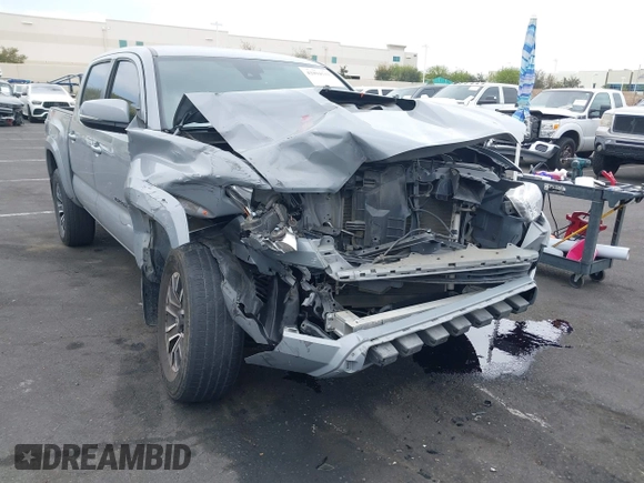 2021 Toyota Tacoma SR with VIN 3TMCZ5AN2MM405869, listed as a IAAI auction lot 42094533 with 78,449 mi miles and . Bid and sale history available at DreamBid. Image 6.