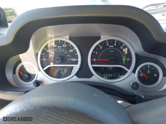 2010 Jeep Wrangler Unlimited Sport with VIN 1J4BA3H19AL229369, listed as a IAAI auction lot 41699172 with 125,021 mi miles. Bid and sale history available at carsss.com. Image 7.