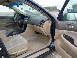 2006 Honda Accord Sdn LX SE with VIN 1HGCM56306A042513, listed as a IAAI auction lot 41926320 with 214,684 mi miles. Bid and sale history available at carsss.com. Image 5.