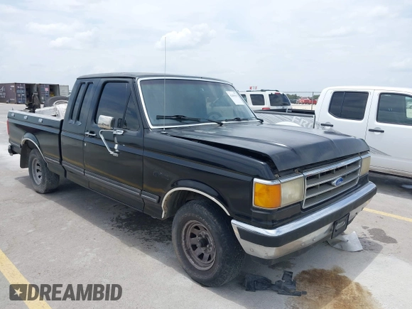 1990 Ford F-150 with VIN 1FTEX15N0LKA06904, listed as a IAAI auction lot 42603529 with 473,180 mi miles and . Bid and sale history available at DreamBid. Image 1.