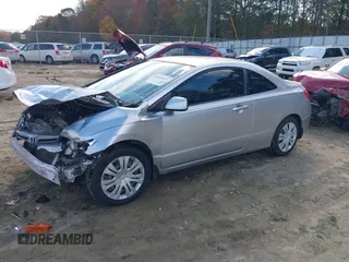 2008 Honda Civic Cpe LX with VIN 2HGFG12688H503166, listed as a IAAI auction lot 40949573 with 166,571 mi miles. Bid and sale history available at carsss.com. Image 2.