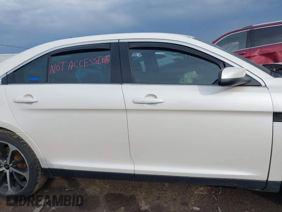 2015 Ford Taurus SEL with VIN 1FAHP2E89FG125416, listed as a IAAI auction lot 42119671 with 190,808 mi miles and . Bid and sale history available at carsss.com. Image 14.