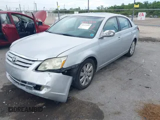 2007 Toyota Avalon XL with VIN 4T1BK36B47U191188, listed as a IAAI auction lot 42127335 with 213,701 mi miles. Bid and sale history available at carsss.com. Image 2.