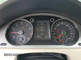 2009 Volkswagen Passat z VIN WVWJK93C49P054575, wystawiony jako Copart lot #57880855 z przebiegiem 148 327 mil mil oraz Szkody całkowita. Historia ofert i sprzedaży dostępna na DreamBid. Obrazek 9.