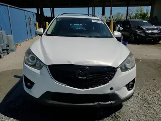2014 Mazda CX-5 Grand Touring with VIN JM3KE4DY6E0363211, listed as a Copart auction lot 48352315 with 214,298 mi miles and Salvage Title. Bid and sale history available at DreamBid. Image 15.