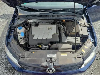 2014 Volkswagen Jetta TDI w/Premium/Nav z VIN 3VWLL7AJ8EM284760, wystawiony jako Copart lot #56986005 z przebiegiem 48 253 mil mil oraz Szkoda całkowita • Salvage title. Historia ofert i sprzedaży dostępna na DreamBid. Obrazek 11.