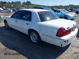 2000 Mercury Grand Marquis LS z VIN 2MEFM75W3YX689323, wystawiony jako IAAI lot #42019687 z przebiegiem 241 045 mil mil oraz . Historia ofert i sprzedaży dostępna na DreamBid. Obrazek 3.