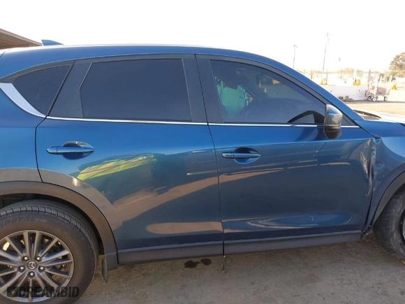 2019 Mazda CX-5 Touring with VIN JM3KFACM1K0517958, listed as a IAAI auction lot 41473681 with NaN miles. Bid and sale history available at carsss.com. Image 13.