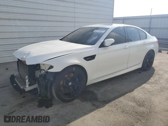 2014 BMW M5 with VIN WBSFV9C54ED097462, listed as a Copart auction lot 70482504 with 76,501 mi miles and Clean Title. Bid and sale history available at carsss.com. Image 1.