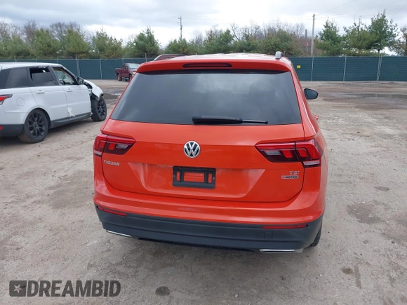 2018 Volkswagen Tiguan S with VIN 3VV0B7AX4JM124500, listed as a IAAI auction lot 41974671 with 76,970 mi miles and . Bid and sale history available at DreamBid. Image 16.
