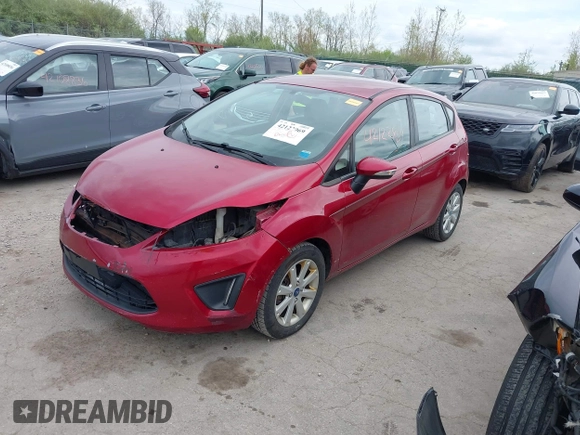 2013 Ford Fiesta SE with VIN 3FADP4EJXDM152463, listed as a IAAI auction lot 42122969 with 66,952 mi miles and . Bid and sale history available at DreamBid. Image 18.