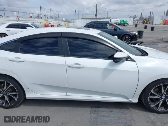 2019 Honda Civic Si z VIN 2HGFC1E58KH707715, wystawiony jako IAAI lot #42108131 z przebiegiem 126 044 mil mil oraz . Historia ofert i sprzedaży dostępna na DreamBid. Obrazek 14.