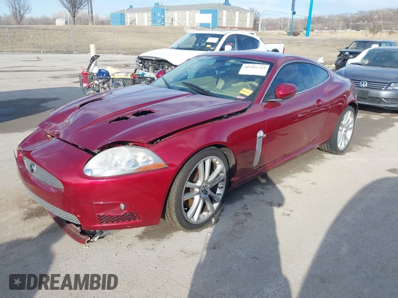 2008 Jaguar XK with VIN SAJWA43C089B22700, listed as a IAAI auction lot 41585734 with 67,946 mi miles. Bid and sale history available at carsss.com. Image 18.