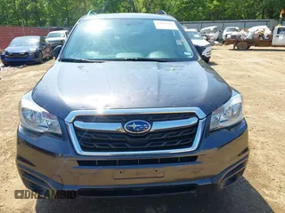 2018 Subaru Forester z VIN JF2SJABC9JH457297, wystawiony jako IAAI lot #42052293 z przebiegiem 94 058 mil mil oraz . Historia ofert i sprzedaży dostępna na DreamBid. Obrazek 6.