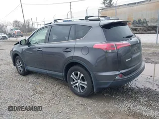 2018 Toyota RAV4 LE with VIN JTMBFREV2JJ727457, listed as a IAAI auction lot 41758208 with 65,740 mi miles. Bid and sale history available at carsss.com. Image 3.