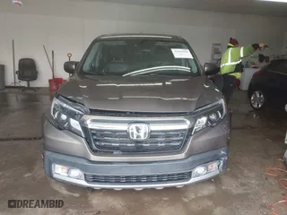2020 Honda Ridgeline RTL-E with VIN 5FPYK3F75LB001516, listed as a IAAI auction lot 41605859 with 93,902 mi miles. Bid and sale history available at carsss.com. Image 12.