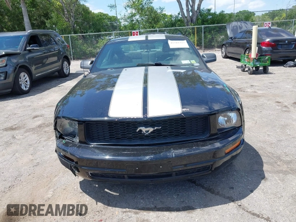 2007 Ford Mustang Deluxe z VIN 1ZVFT80N675242314, wystawiony jako IAAI lot #42318323 z przebiegiem 171 017 mil mil oraz . Historia ofert i sprzedaży dostępna na DreamBid. Obrazek 12.