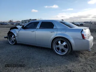 2005 Chrysler 300 C with VIN 2C3AA63H15H674199, listed as a Copart auction lot 47628215 with 154,052 mi miles and Salvage Title. Bid and sale history available at DreamBid. Image 2.