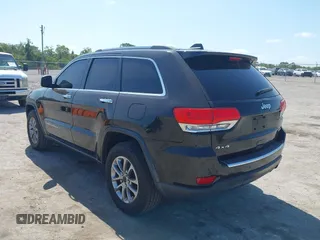 2015 Jeep Grand Cherokee Limited with VIN 1C4RJFBG8FC790575, listed as a IAAI auction lot 42124709 with 248,827 mi miles. Bid and sale history available at carsss.com. Image 3.